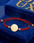 PULSERA CON MEDALLON - ROJO